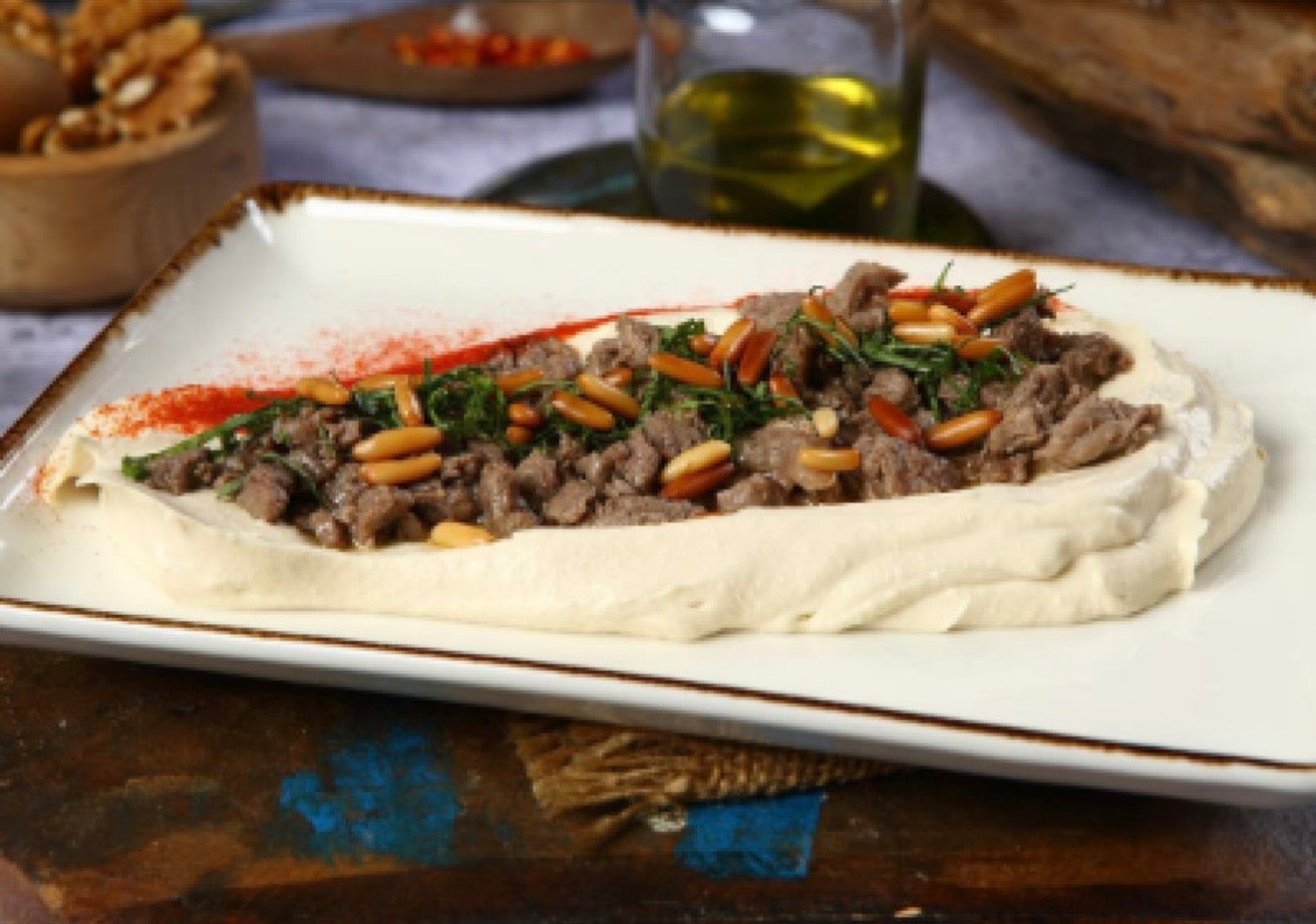 Hummus with Meat And Pine Nuts